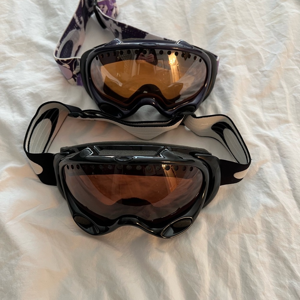 Two pair Oakley Black Ski Goggles with Adjustable Strap and Anti-Fog Ventilation
